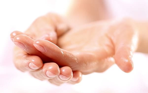 Wash hands in lukewarm water